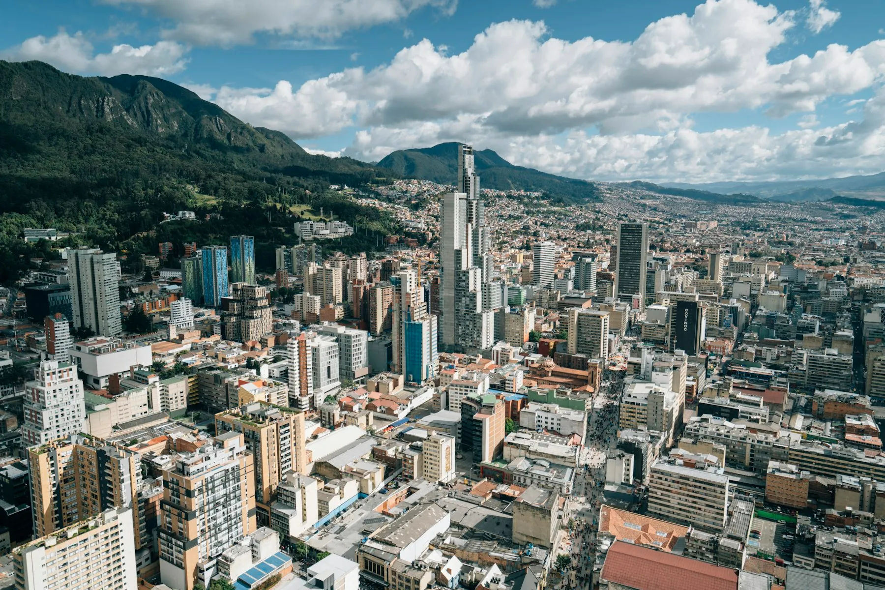 Aerial view of Bogotá with the Andes behind the city